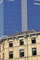 Biosphoto | 1605100 | Abandoned, dilapidated building in front of the Tour du Midi, tallest building in Belgium, building of the European Union, Brussels, Belgium, Europe | © Walter G. Allgoewer / imageBROKER / Biosphoto