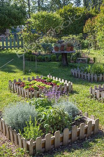 Biosphoto | 2083873 | Aromatic plants in a square foot kitchen garden, Provence, France | &copy; Philippe Giraud / Biosgarden / Biosphoto