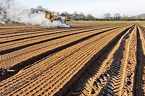 Biosphoto | 2575911 | Automated steam disinfection of soil at a depth of 10-14 cm before sowing or planting. Market gardening, Gaec Seuru, Champagne, Sarthe, Pays de la Loire, France | &copy; Michel Gile / Biosphoto