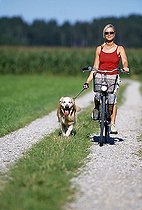 Biosphoto | 1485658 | Biker with dog, Starnberg, Bavaria, Germany | &copy; Norbert Eisele-Hein / imageBROKER / Biosphoto