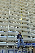 Biosphoto | 1605590 | Boy, 9, playing with his Nintendo in front of a high-rise apartment building, satellite town of Chorweiler in Cologne, North Rhine-Westphalia, Germany, Europe | © Walter G. Allgoewer / imageBROKER / Biosphoto