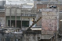 Biosphoto | 1604972 | Boy on a staircase, Charminar, Hyderabad, Andhra Pradesh, India, Asia | © Olaf Krueger / imageBROKER / Biosphoto