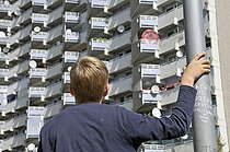 Biosphoto | 1605612 | Boy standing in front of a high-rise apartment building with balconies and satellite dishes, satellite town of Chorweiler in Cologne, North Rhine-Westphalia, Germany, Europe | © Walter G. Allgoewer / imageBROKER / Biosphoto