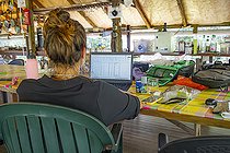 Biosphoto | 2583267 | Camp inselberg, scientific station in the Nouragues nature reserve. Common carbet used as kitchen and office at Camp Inselberg, a convivial space in the middle of the Amazon rainforest - Régina, French Guiana. | &copy; Vincent Premel / Biosphoto