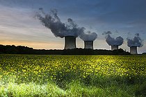 Biosphoto | 2575282 | Cattenom nuclear power plant in Moselle with four reactors in operation at sunset and a field of rapeseed in bloom, France | &copy; Claudius Thiriet / Biosphoto