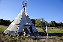 Biosphoto | 1251482 | Chair in front of a  Teepee | &copy; Franck Fouquet / Biosphoto