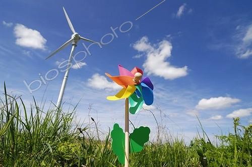 Biosphoto | 1509767 | Colourful pinwheel and a wind turbine, symbolic image for wind energy | © Christian Ohde / imageBROKER / Biosphoto