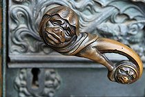 Biosphoto | 1607154 | Doorhandle with grimace face and lock at a side portal of the cathedral of Cologne, NRW, Germany | © Florian Kopp / imageBROKER / Biosphoto