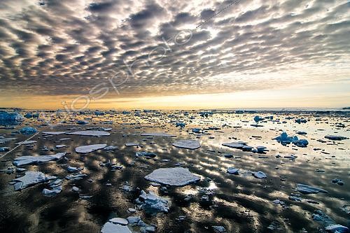 Biosphoto | 2581680 | Drifting ice under a dappled sky in the Svalbard archipelago | &copy; Raphaël Sané / Biosphoto