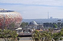 Biosphoto | 1600738 | FIFA World Cup 2010, construction site of the Soccer City stadium overlooking the city center CBD, Soweto district, Johannesburg, South Africa, Africa | © Florian Kopp / imageBROKER / Biosphoto