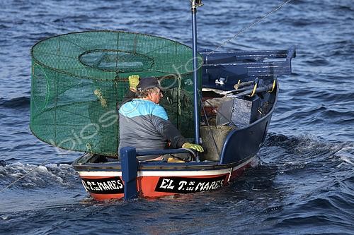 Biosphoto | 2609495 | Fisherman on the north coast of Tenerife. Fishing sector. Shrimp fishing (Plesionika narval) is a professional and artisanal activity carried out from small boats. Traps are placed on the seabed at depths of between 50 and 150 meters, and some fish are caught there. It is practiced year-round, although catches are more abundant in summer. Production is mainly for local consumption. BOAT: El Terror de los Mares. FISHERMAN: Frisco. San Marcos Fishermen's Guild of Icod de los Vinos, Tenerife, Canary Islands. | © Sergio Hanquet / Biosphoto