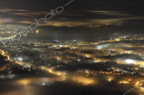 Biosphoto | 1100567 | Fog and light pollution on the city of Geneva Switzerland | &copy; Christophe Suarez / Biosphoto