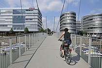 Biosphoto | 1605627 | Hitachi Power Office, the first height-adjustable suspension bridge in the world and Five Boats office buildings, Inner Harbour, Duisburg, North Rhine-Westphalia, Germany, Europe | © Walter G. Allgoewer / imageBROKER / Biosphoto