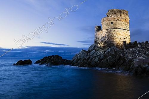 Biosphoto | 2593273 | La Tour Genoise d'Erbalunga, built in 1530, stands at the end of the rock tongue that marks the entrance to the small fishing port, Port D'Erbalunga, Cap Corse, Corsica, France. | &copy; Hyacinthe Sambroni / Biosphoto