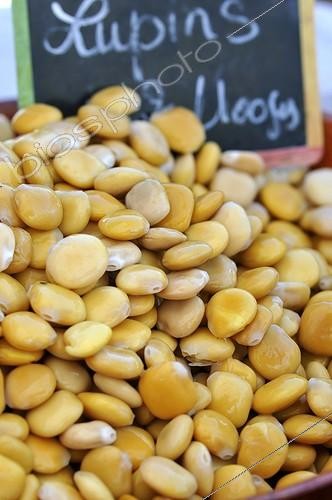Biosphoto | 1153576 | Lupine seeds in brine at a stall Provence France  | &copy; Denis Bringard / Biosphoto