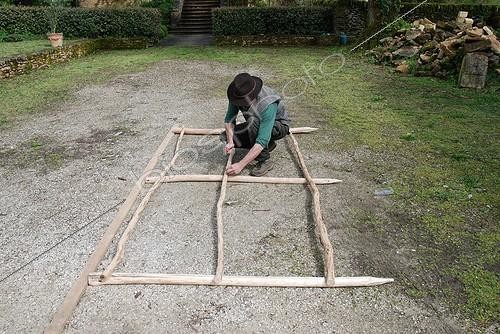 Biosphoto | 1934065 | Man making a garden fence | &copy; Serge Lapouge / Biosphoto