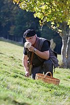 Biosphoto | 1254295 | Man picking mushrooms in a cleary France | &copy; Bruno Mathieu / Biosphoto