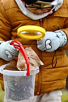 Biosphoto | 2609582 | Nature discovery in primary schools - Child observing a dead leaf with a magnifying glass - France | &copy; Dominique Delfino / Biosphoto