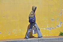 Biosphoto | 1601940 | Passerby along a house wall in Bo-Kaap the traditional muslim city district in Cape Town, South Africa, Africa | © Walter G. Allgoewer / imageBROKER / Biosphoto