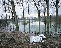 Biosphoto | 1490113 | Refrigerator swept up in a flood plain, flotsam, flooding, CFC, CFCs | &copy; Hartmut Schmidt / imageBROKER / Biosphoto
