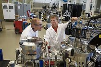 Biosphoto | 1486763 | Research scientist Matthew Page, left, and master research technician Marc Landry work on an experiment aimed at developing photovoltaic technology at the National Renewable Energy Laboratory, operated by the US Department of Energy, Golden, Colorado, USA | &copy; Jim West / imageBROKER / Biosphoto
