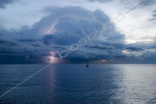 Biosphoto | 2593282 | Sailboat sailing into a storm on the Tyrrhenian Sea in Upper Corsica, Tyrrhenian Sea | &copy; Hyacinthe Sambroni / Biosphoto
