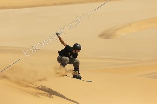Biosphoto | 1883685 | Sand boarding in the dunes of the Namib Desert  | &copy; Thomas Dressler / Biosphoto