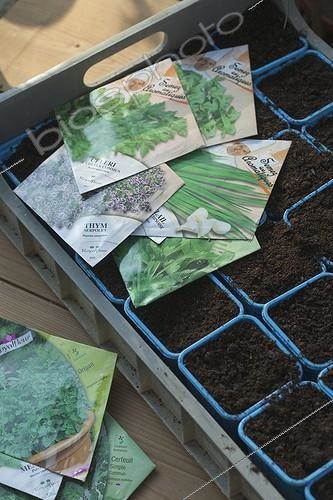 Biosphoto | 1361833 | Seed packets of herbs and buckets of vegetal mould France | &copy; Philippe Giraud / Biosphoto
