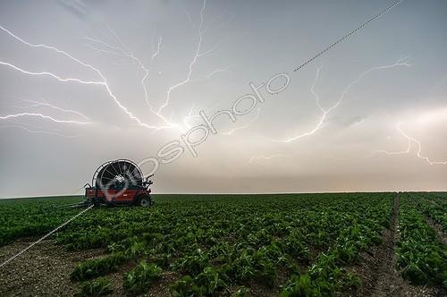 Biosphoto | 2025478 | Severe thunderstorms over the countryside in summer - France ; The rear of the storm is accompanied by great flashes crawling under the anvil. These are spiders or crawlers. | &copy; Xavier Delorme / Biosphoto