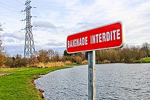 Biosphoto | 2575899 | Sign prohibiting swimming at a lake and high-voltage pylon, Change, Sarthe, Pays de la Loire, France | &copy; Michel Gile / Biosphoto