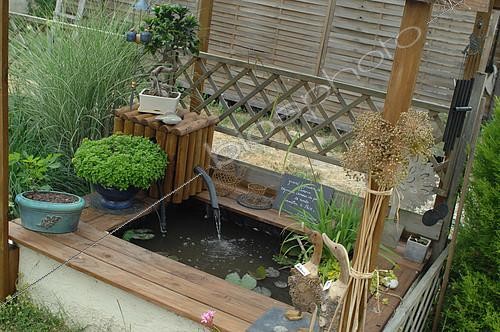 Biosphoto | 2073151 | Small garden pond, Jardin de l’Écriture et de la Poésie, Garden of Writing and Poetry, Eure et Loir, France | &copy; Catherine Fruhinsholz / Biosphoto