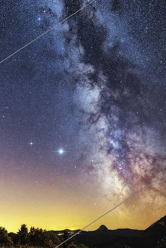 Biosphoto | 2458262 | Starry sky in Ardèche, the Milky Way, Jupiter and Saturn shine in a pure sky, north of the Mont Gerbier des Joncs, visible in the middle of the horizon (4 minutes exposure), France | &copy; Jean-Philippe Delobelle / Biosphoto