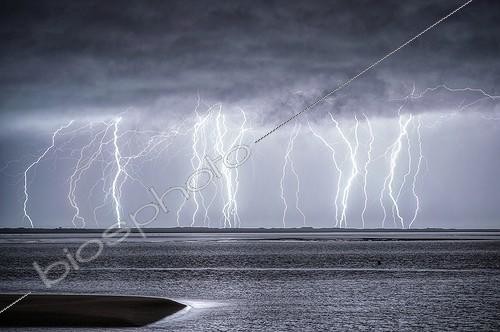 Biosphoto | 2024029 | Storm over the Atlantic Ocean in autumn - France  ; The average intensities of lightning strikes reached 80 000 amperes according Météorage.<br><br>Overlay 10 photos 30 seconds equivalent to a period of 5 minutes. | &copy; Xavier Delorme / Biosphoto