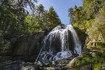 Biosphoto | 2593248 | The Cascade de Meli, a majestic waterfall set amidst the surrounding greenery. To reach the Meli waterfall at the Hameau de Canaglia, a sign, refuge de l'Onda pastricciola, indicates the start of the hike, Vivario, Corsica, France. | &copy; Hyacinthe Sambroni / Biosphoto