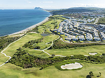 Biosphoto | 2609294 | The La Hacienda Links Golf Resort at the Mediterranean Sea with the Rock of Gibraltar (British) in the distance. Prominent the Fairmont La Hacienda hotel. Aerial view. Drone shot. Cádiz province, Andalusia, Spain. | &copy; Thomas Dressler / Biosphoto
