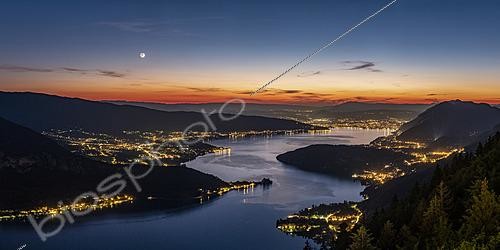 Biosphoto | 2624361 | Three-day-old crescent moon setting over Lake Annecy at nautical twilight, viewed from the Forclaz Pass, with the Duingt peninsula separating the small and large lakes, Montmin, Haute-Savoie, France. | &copy; Philippe Jacquot / Biosphoto