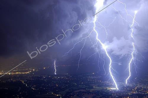 Biosphoto | 474089 | Thriple impact of lightnings on Genève city France ; During a violent storm. | &copy; Christophe Suarez / Biosphoto