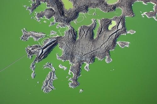 Biosphoto | 1383688 | Volcanic rocks on jade coloured waters of Lake Turkana Kenya ; It is the world's largest desert lake and the world's largest alkaline lake. | &copy; Martin Harvey / Biosphoto