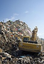 Biosphoto | 1480613 | Waste and garbage truck at disposal site Riederberg, Woergl, Tyrole, Austria | &copy; Roland Muehlanger / imageBROKER / Biosphoto