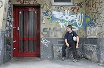 Biosphoto | 1608109 | Weary boy, 10 years, sitting in a doorway, Cologne, North Rhine-Westphalia, Germany, Europe | © Walter G. Allgoewer / imageBROKER / Biosphoto
