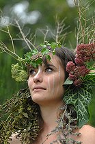Biosphoto | 2073110 | Young woman with crown flowers on her head - living in harmony with nature - reconnecting with nature | &copy; Catherine Fruhinsholz / Biosphoto