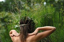Biosphoto | 2073158 | Young woman with crown flowers on her head - living in harmony with nature - reconnecting with nature | &copy; Catherine Fruhinsholz / Biosphoto